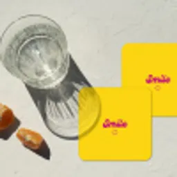 Smile - Geel - Roze onderzetter kurk middel -sfeer4