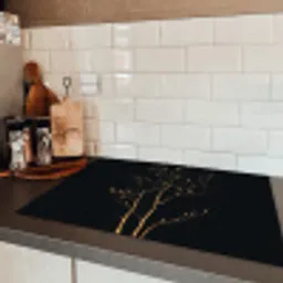 Takken - Blaadjes - Zwart Inductie beschermer vinyl 3mm klein -sfeer3