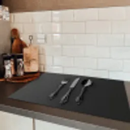 Bestek - Zwart Inductie beschermer vinyl 3mm klein -sfeer3