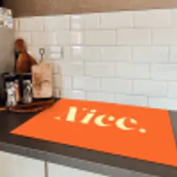Oranje - Gebroken wit - Nice Inductie beschermer vinyl 3mm klein -sfeer3