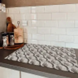 Zand - Schelpenvorm - Grijs Inductie beschermer vinyl 3mm klein 276 -sfeer3