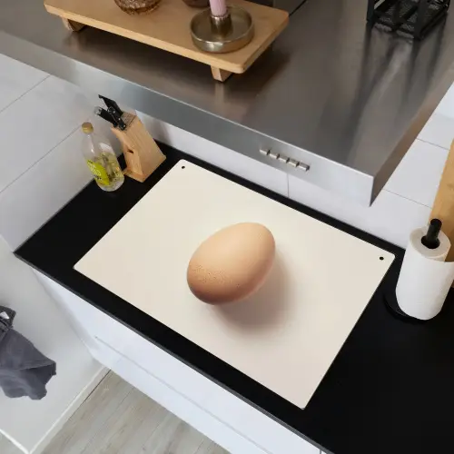 Ei - Beige - Ovaal - Egaal Inductie beschemer met haakjes klein -sfeer1