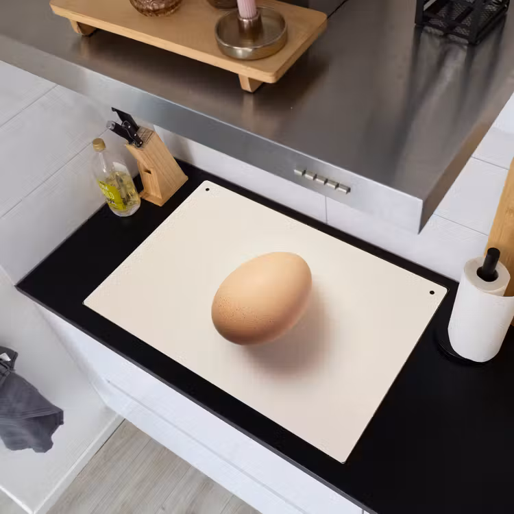 Ei - Beige - Ovaal - Egaal Inductie beschemer met haakjes klein -sfeer1