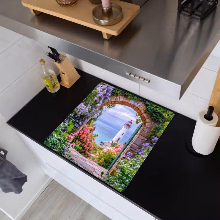 Doorkijk - Vuurtoren - Bloemen - Uitzicht Inductie beschemer met haakjes middel -sfeer1