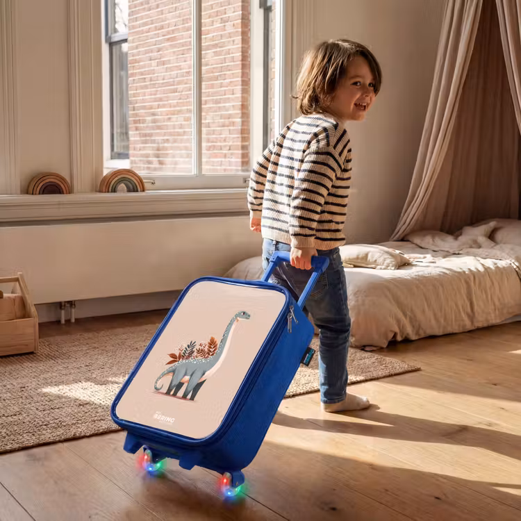 Blauwe dinosaurus op een beige achtergrond Kinderkoffer - Blauw klein -sfeer1