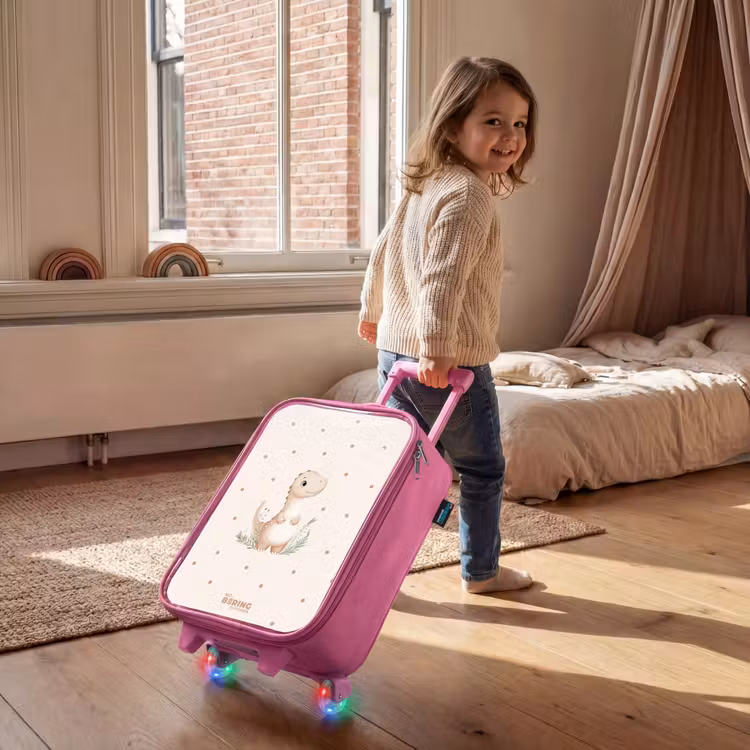 Beige dino op een stippen achtergrond Kinderkoffer - Roze klein -sfeer1