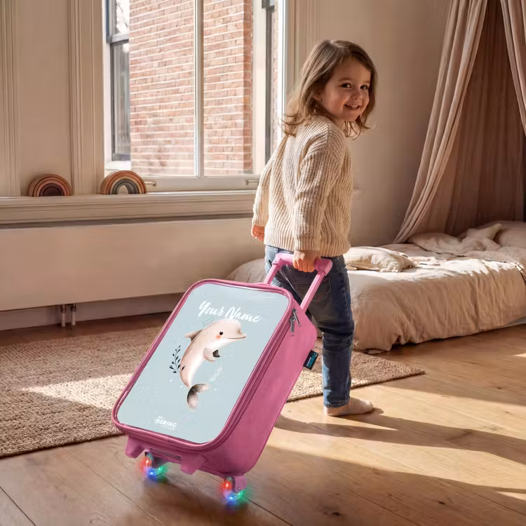 Beige dolfijn in blauw water Kinderkoffer - Roze klein -sfeer1