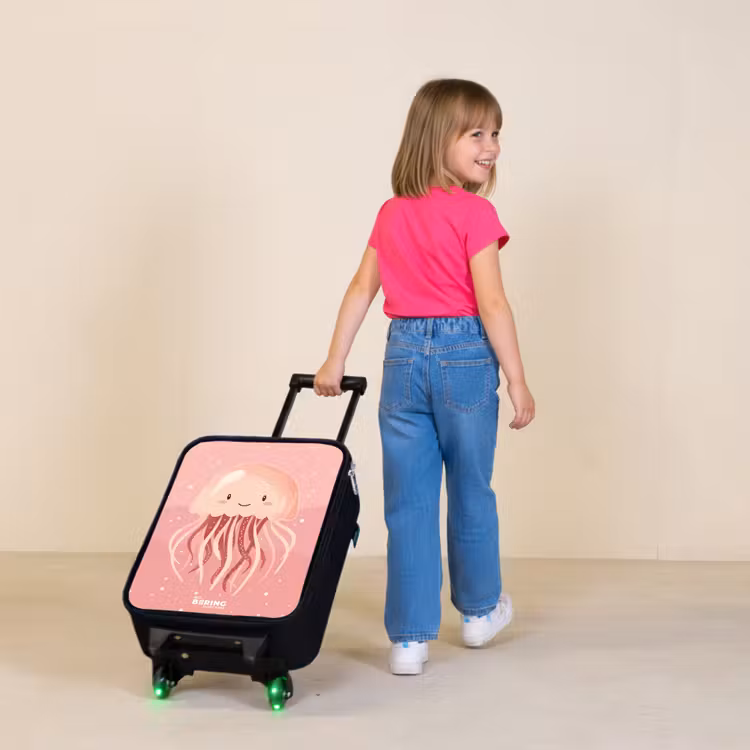 Roze kwal met gezicht Kinderkoffer - Zwart klein -sfeer1
