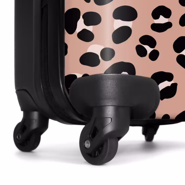 Panterprint op roze achtergrond NBS - Handbagage koffer - Volwassenen Unisex middel -wiel