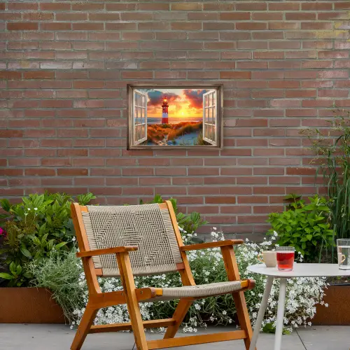Doorkijk - Raam - Vuurtoren - Zonsondergang - Strand Tuinposter op houten frame 2 cm dik klein -sfeer3