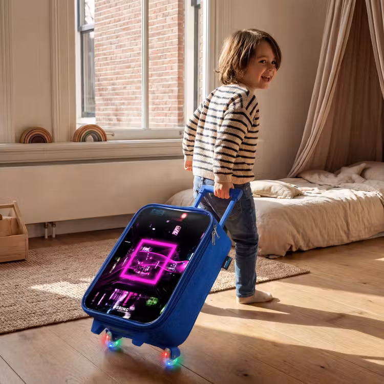 Kids’ Suitcase - Blue - Bright pink square above a wet street — 5